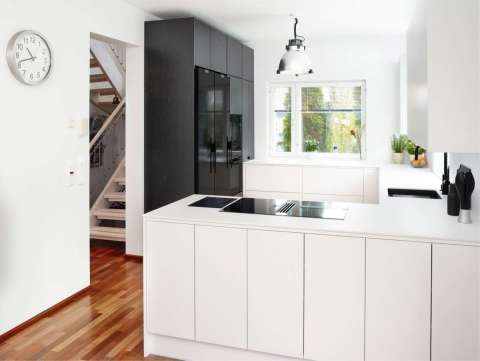 Scandi style Puustelli Miinus kitchen with painted white birch veneer cabinetry