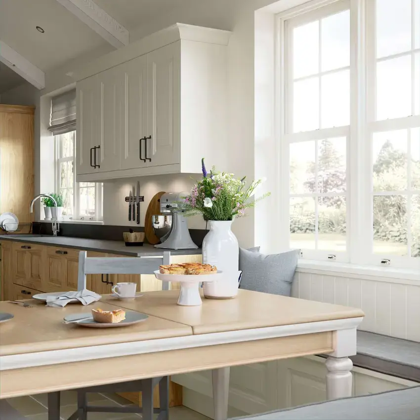 Traditional shaker-style kitchen seating area painted ivory