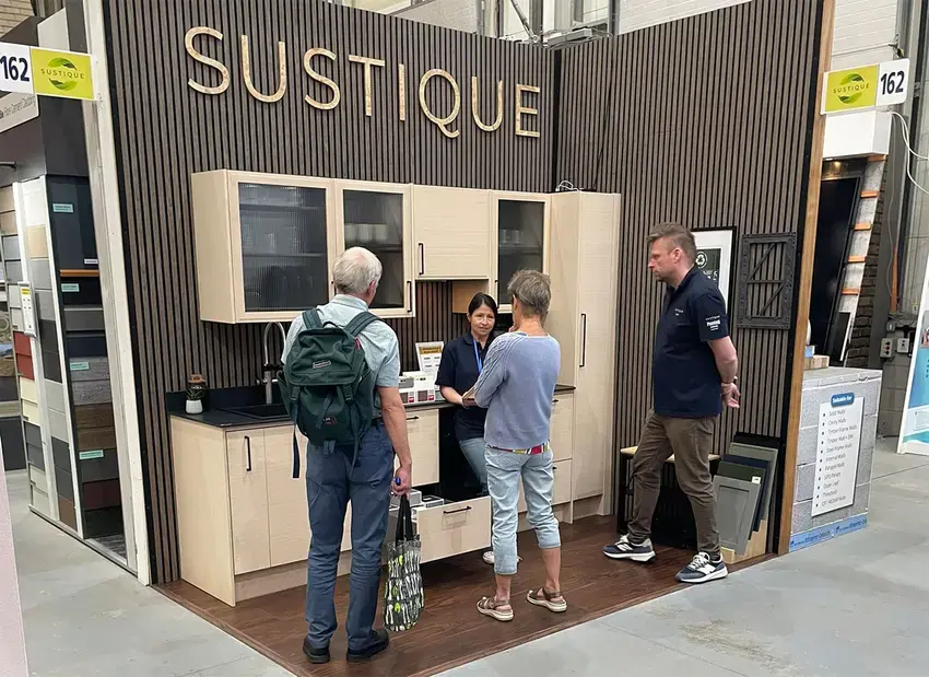 Sustique NSBRC Trade Stand with Veronica and Tony talkning to project owners