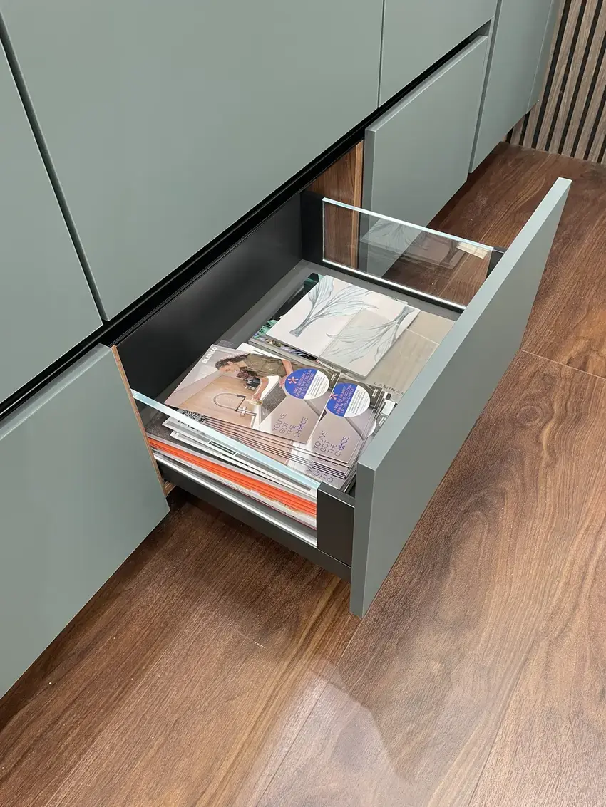 sustique engineered kitchen range demonstrator showing pan drawer lit glass sides