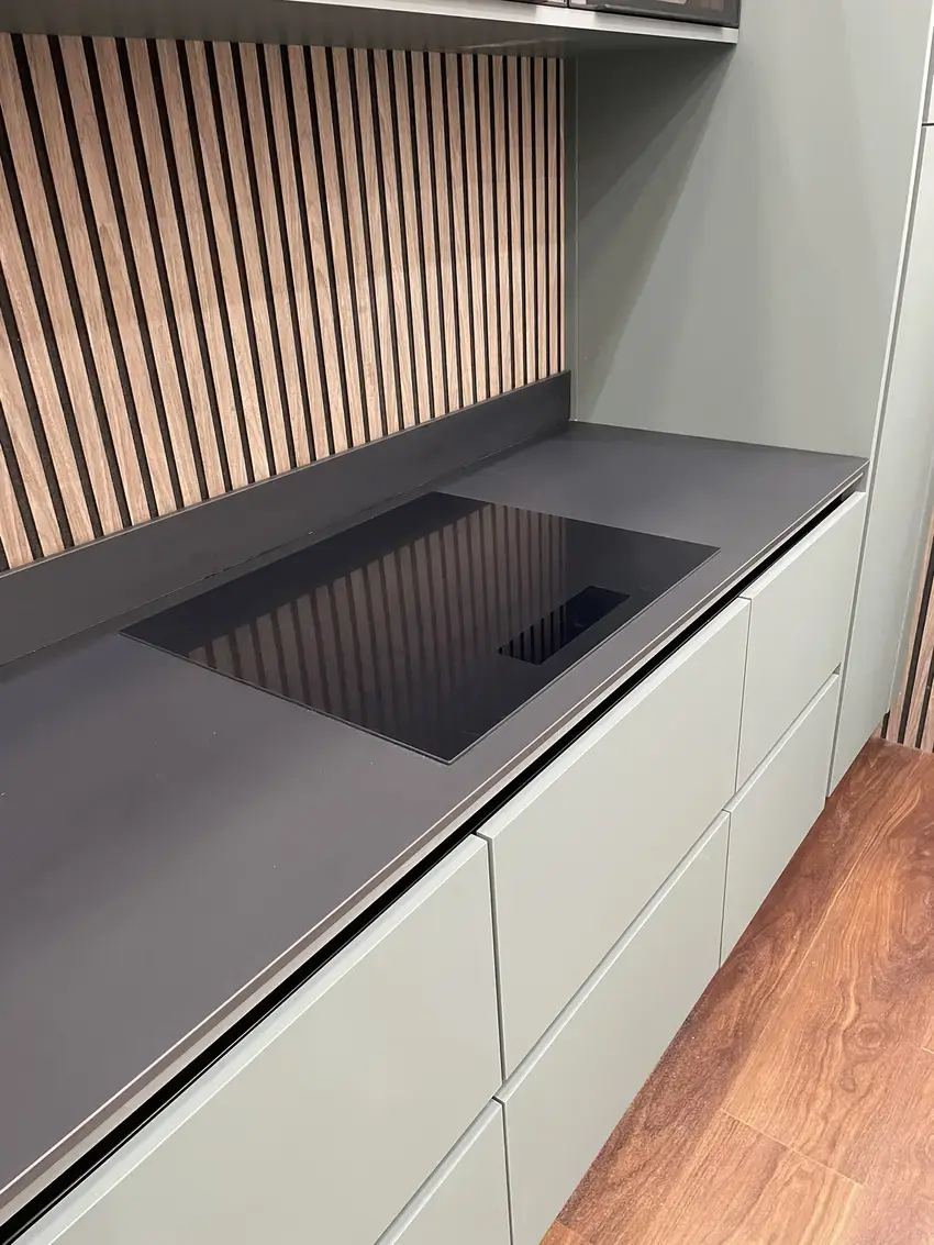 sustique engineered kitchen range showing porcelain worktop and induction hob