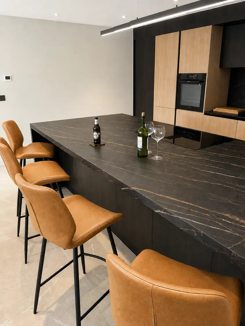 modern handleless sustique engineered kitchen showing island surface