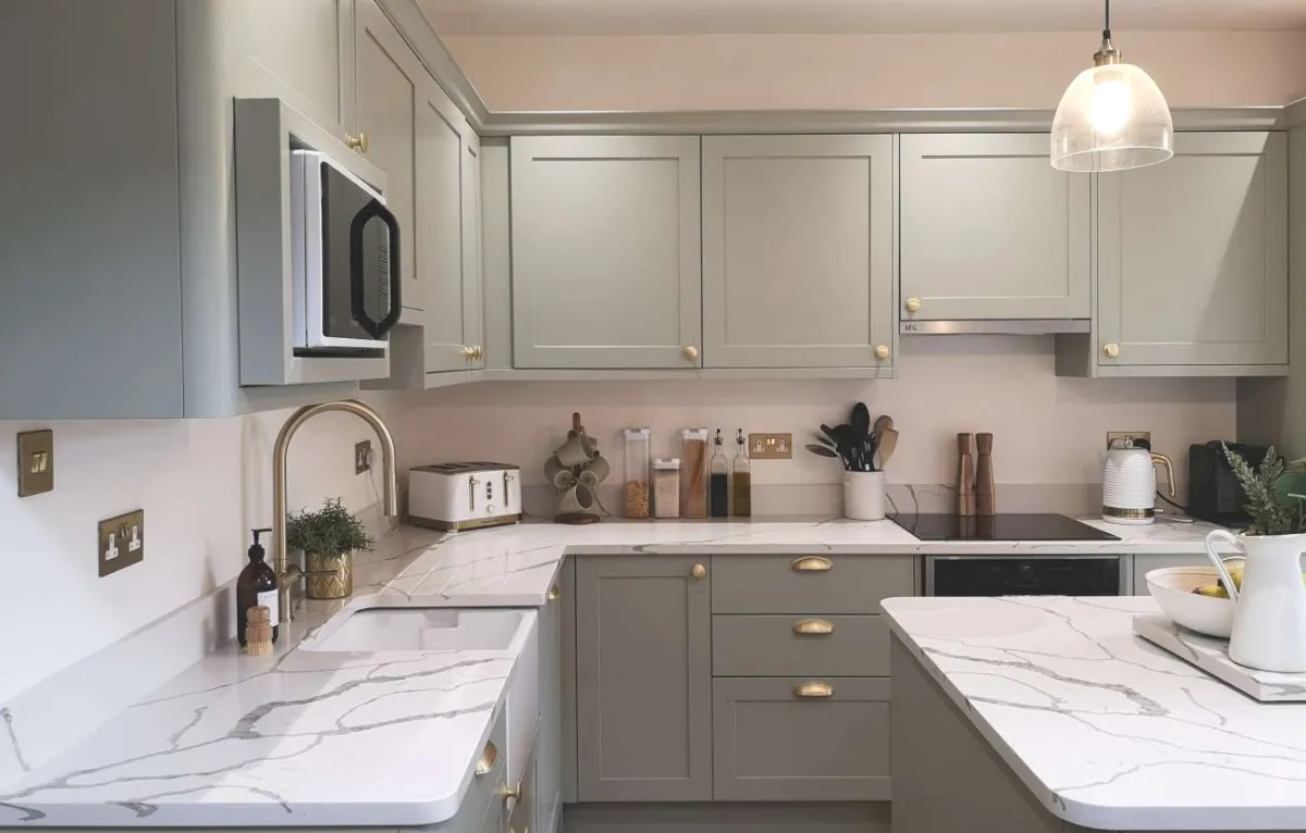 Contemporary shaker-style kitchen painted sage green