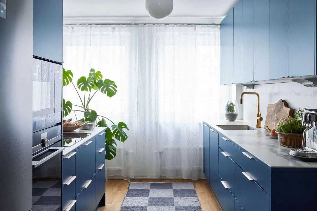 Modern compact blue painted Puustelli Miinus kitchen