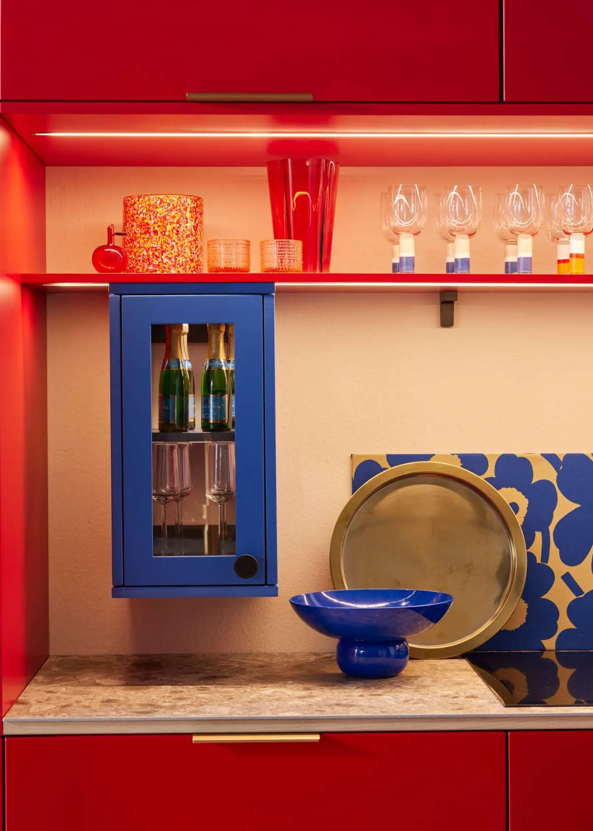 Modern style Puustelli Miinus kitchen showing blue wall cabinet