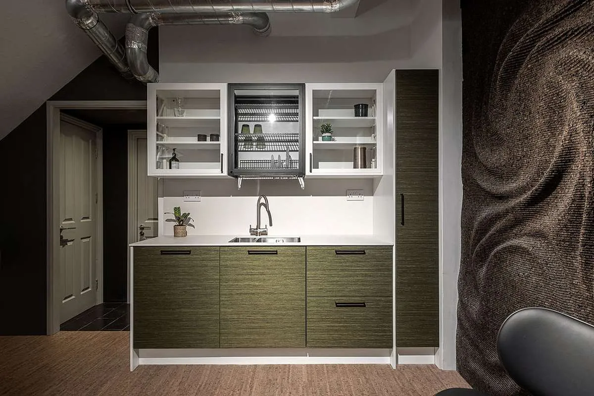 Scandi style Puustelli Miinus kitchen with wild green birch veneer doors