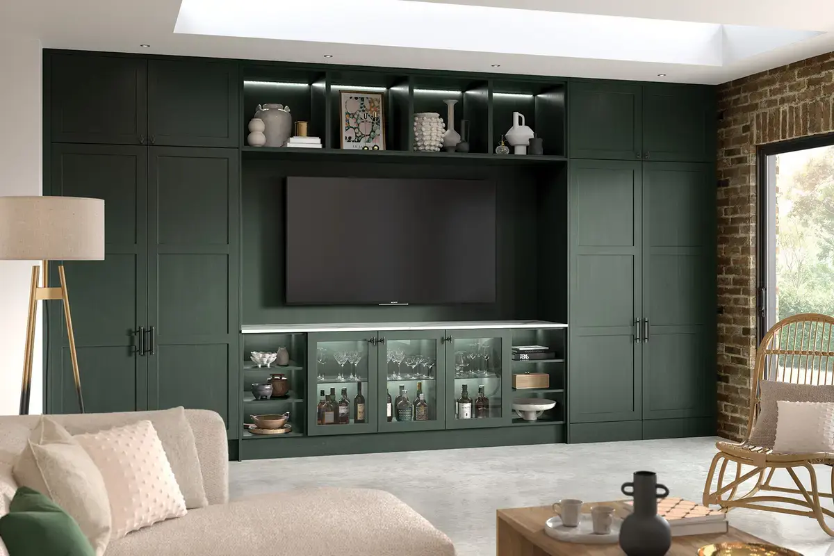Slim frame shaker-style media unit with pivot pocket doors
