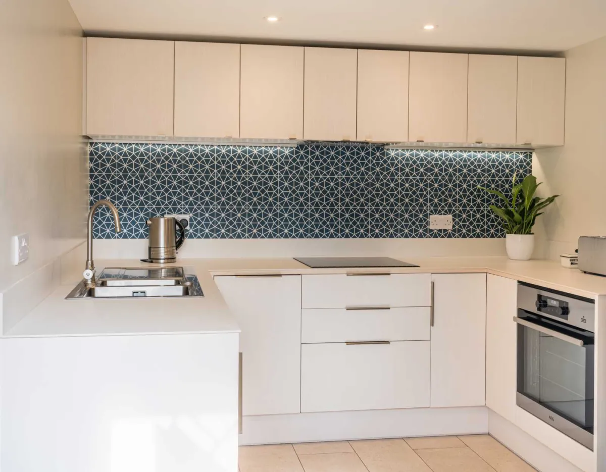 Scandinavian style white small kitchen using Puustelli Miinus frames