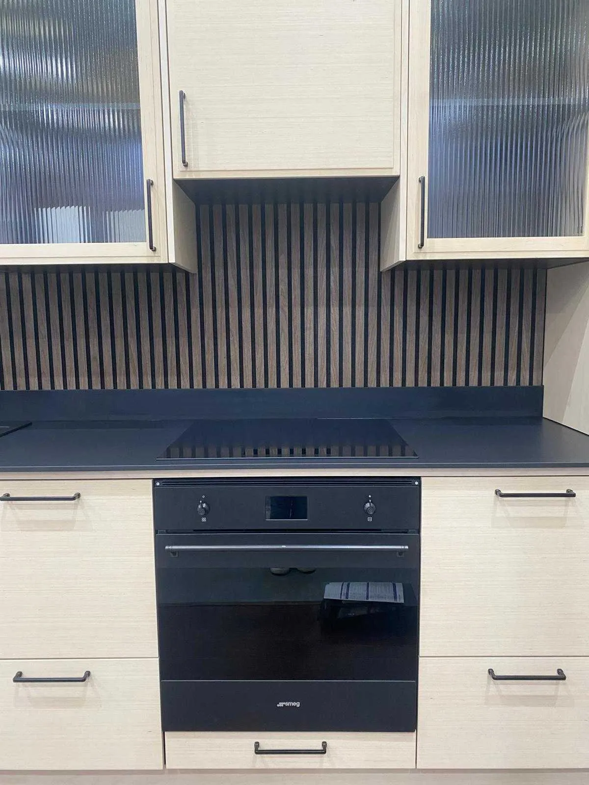 Puustelli Miinus sustainable kitchen with Smeg induction hob and oven